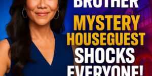 Julie Chen Moonves standing in front of a promotional backdrop for Big Brother Season 27, teasing the arrival of a mysterious houseguest